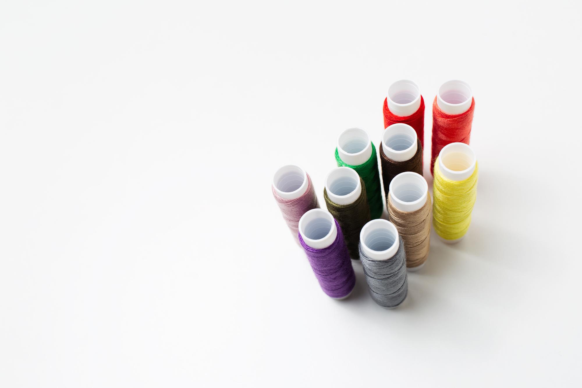 Thread spools on rack